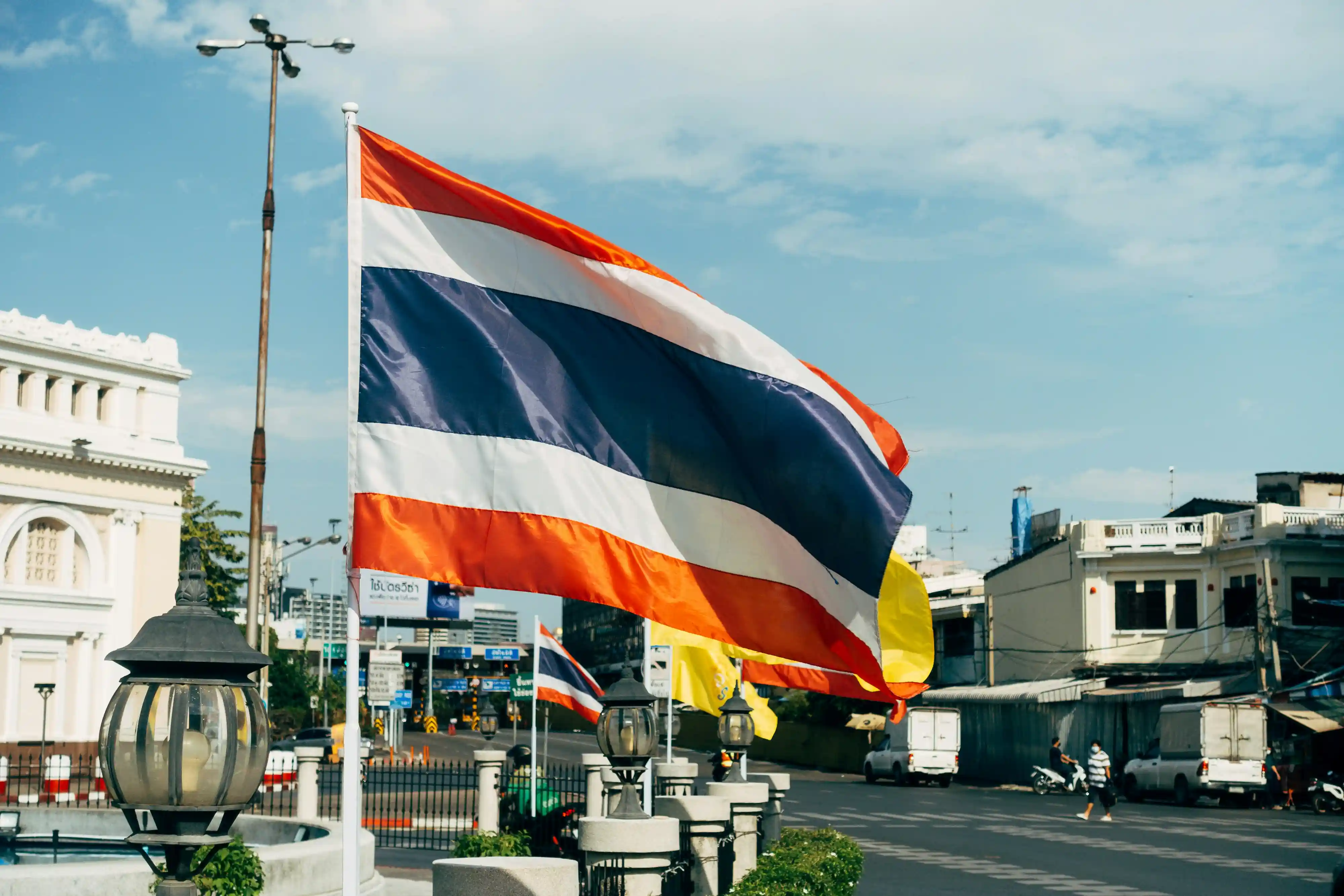Thai flag flying in a Bangkok street